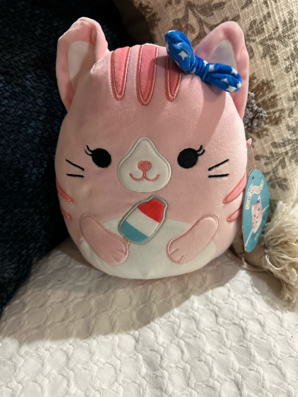 Squishmallows Laura the Cat with Blue Bow and Popsicle Detail